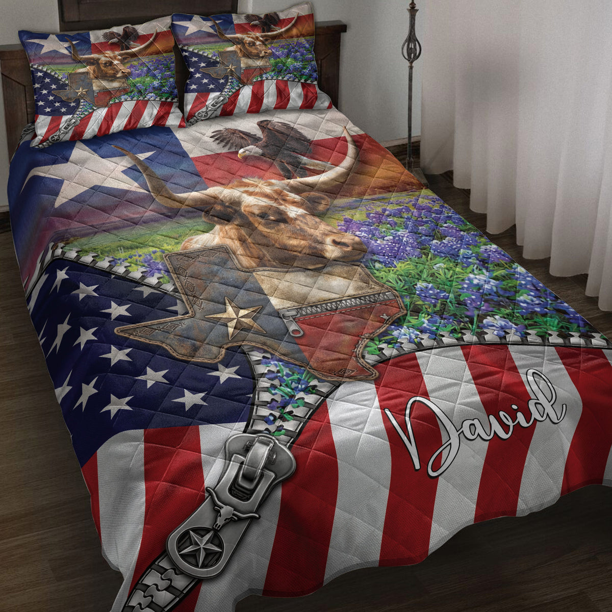 Texas longhorn quilt blanket displayed on a bed with bluebonnets, patriotic stars and Western artwork