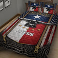 Close view of Texas longhorn quilt blanket with Lone Star colors, gold stars, Western texture, and bedroom styling