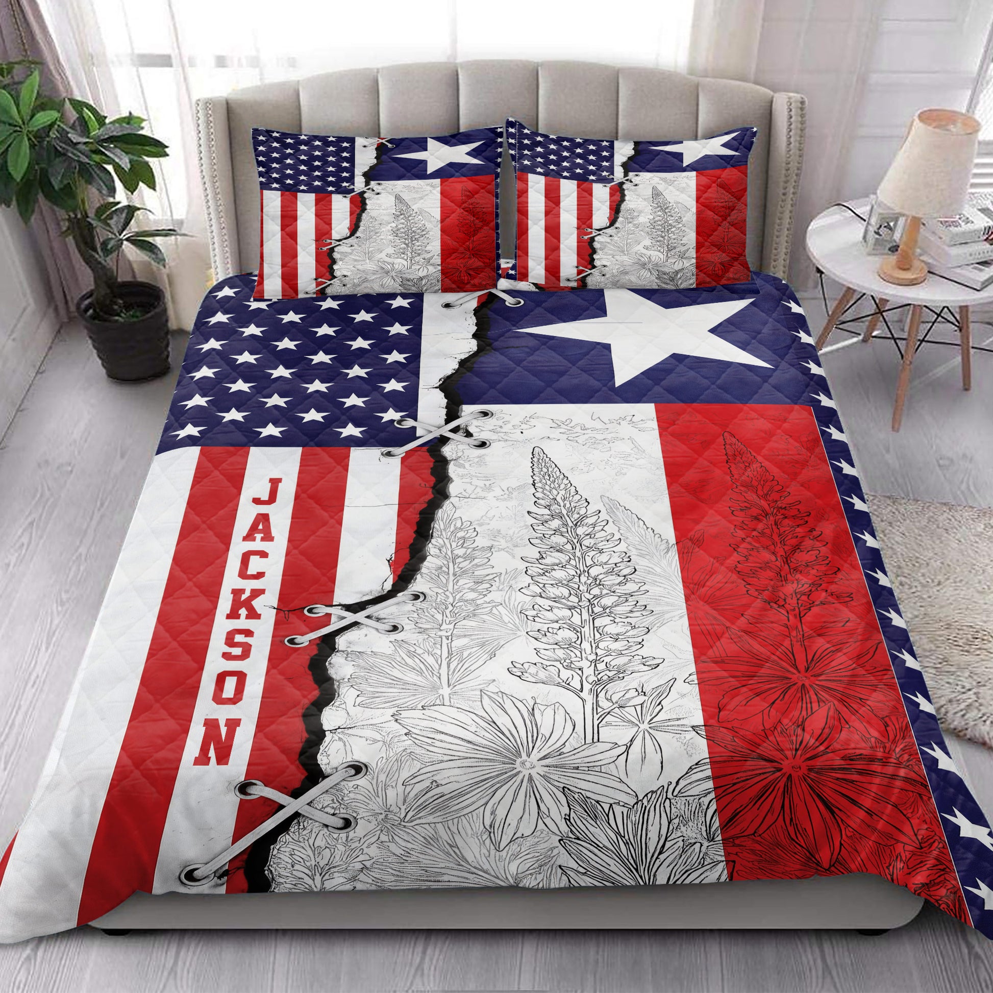 Texas Lone Star quilt bedding set styled in a bright bedroom with floral patriotic artwork