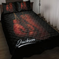 Black boxing quilt blanket displayed on a bed with red boxing gloves and gear artwork