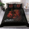 Boxing quilt blanket styled in a bedroom with red gloves and punching bag artwork