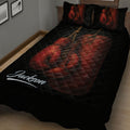 Close bedroom view of a black boxing quilt with dramatic red gloves and boxing gear artwork