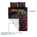 Motocross quilt showing the printed front, white quilted backing, and dirt bike rider design