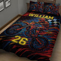 Dirt bike motocross quilt blanket displayed on a bed with racing artwork and bold athletic graphics