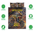 Motocross quilt bedding set with dirt bike artwork shown alongside soft, breathable, washable, and colorfast icons