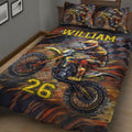 Motocross quilt blanket and pillowcase option displayed on a bed with dramatic dirt bike artwork