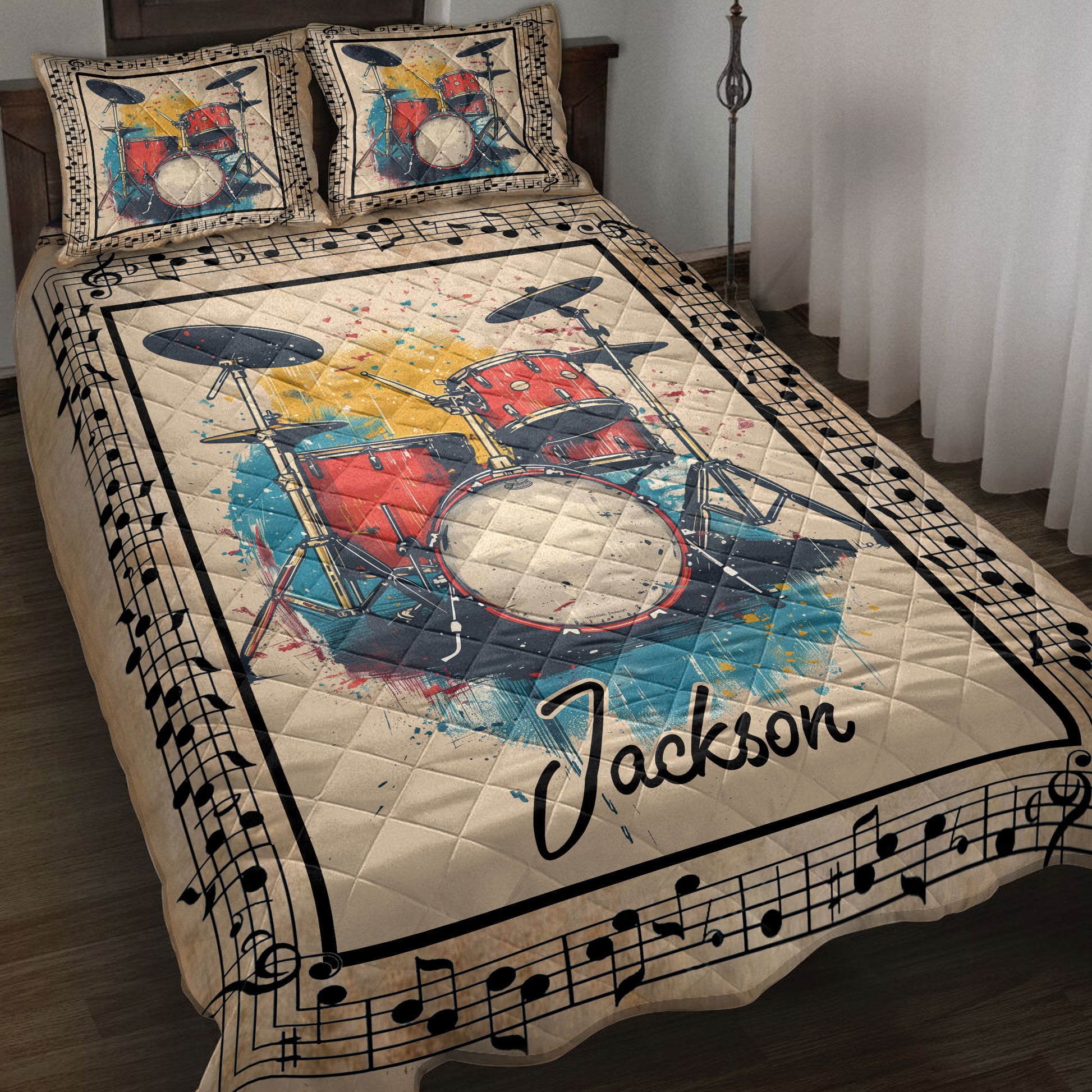 Drum quilt blanket bedding set displayed on a bed with red drum kit artwork and musical note borders