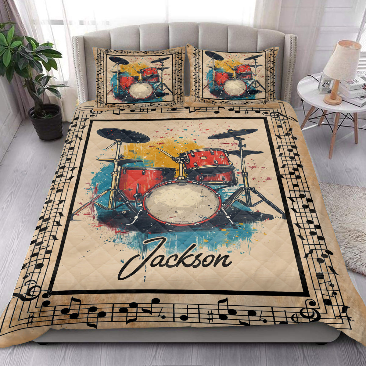 Drum quilt bedding styled in a bright bedroom with colorful drum kit artwork and musical note borders