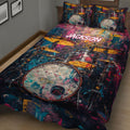 Close-up bedroom view of a vibrant drum quilt blanket with cymbals and drum kit artwork