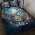 Drum quilt blanket displayed on a bed with cosmic artwork, cymbals, and a vivid blue music theme