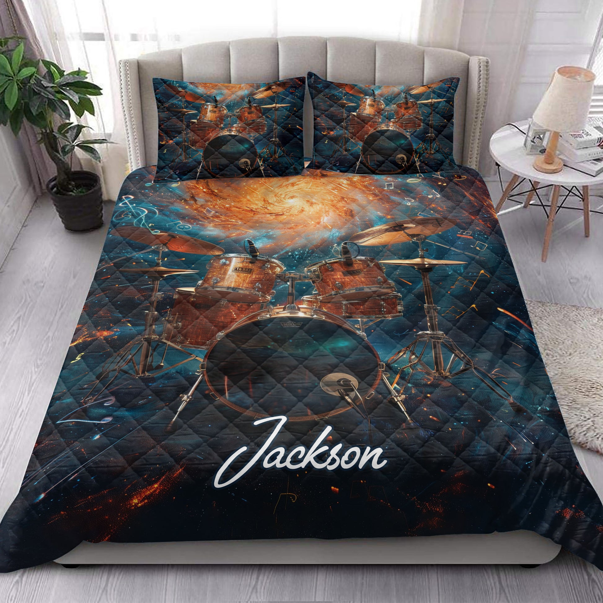 Drum quilt bedding set styled in a bright bedroom with matching drum artwork