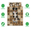 Australian Shepherd quilt bedding set displayed with coordinated pillowcases, paw print patches, and plaid artwork