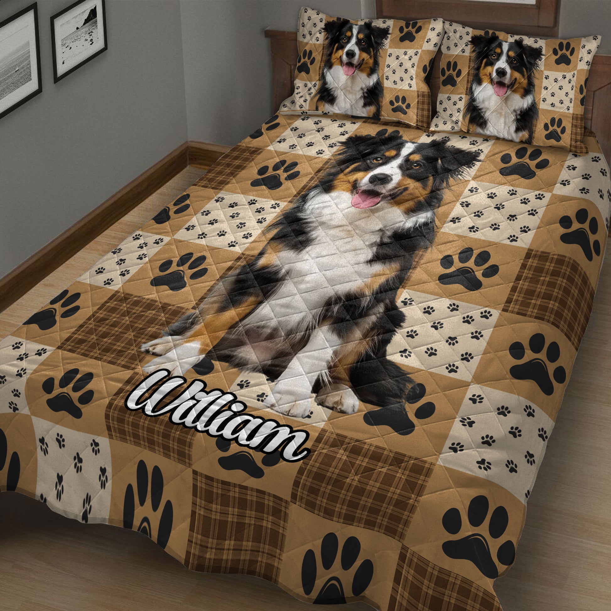 Australian Shepherd quilt blanket spread across a bed with a large dog portrait, paw prints, and rustic plaid details