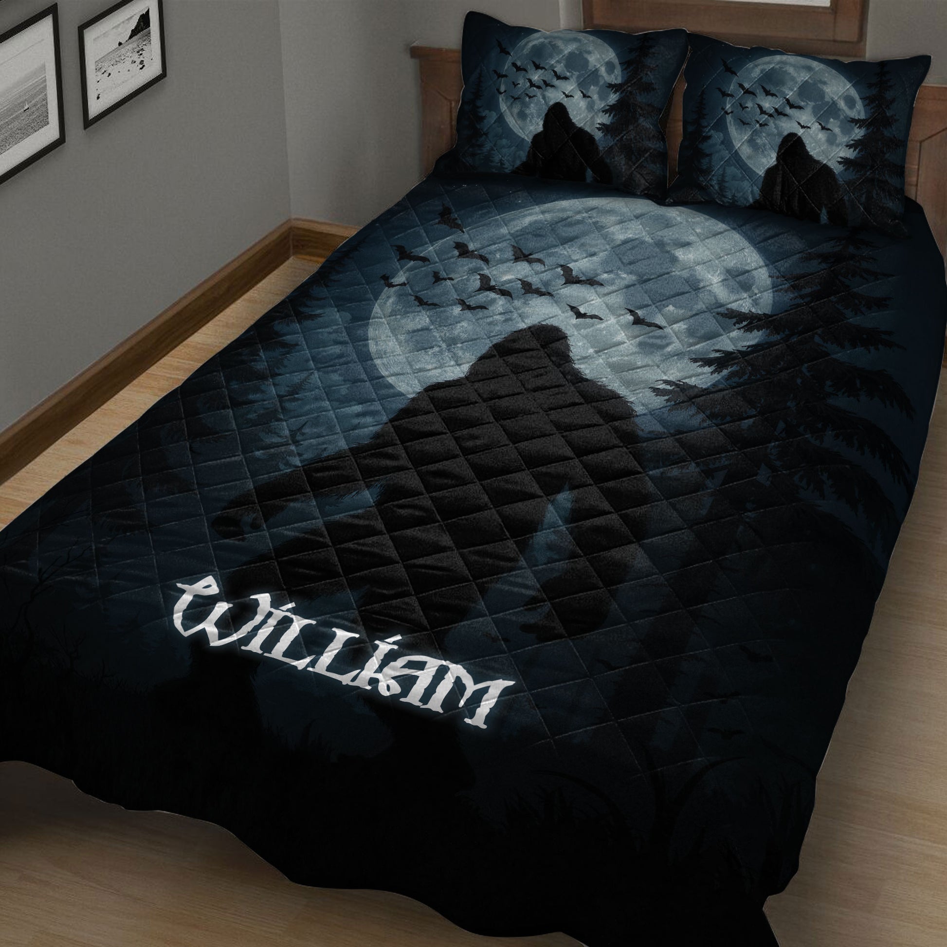 Close view of Bigfoot quilt blanket featuring a shadowy forest silhouette beneath a full moon