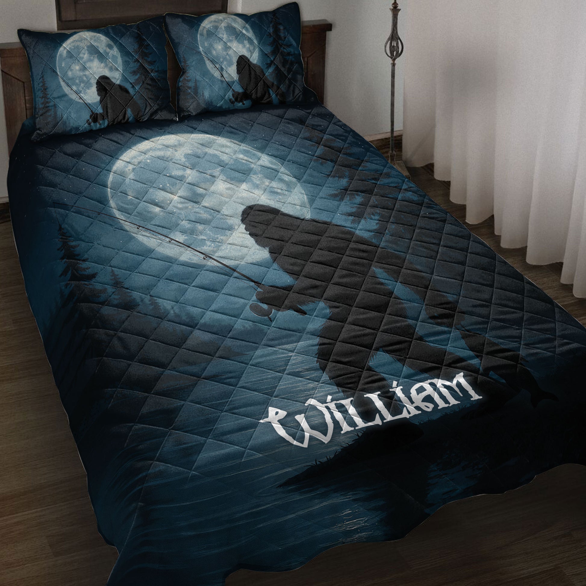 Bigfoot quilt blanket set on a bed with moonlit forest artwork in deep blue tones