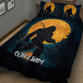 Close view of Bigfoot quilt blanket artwork with a fishing Sasquatch, forest trees, golden moon, and dark blue tones