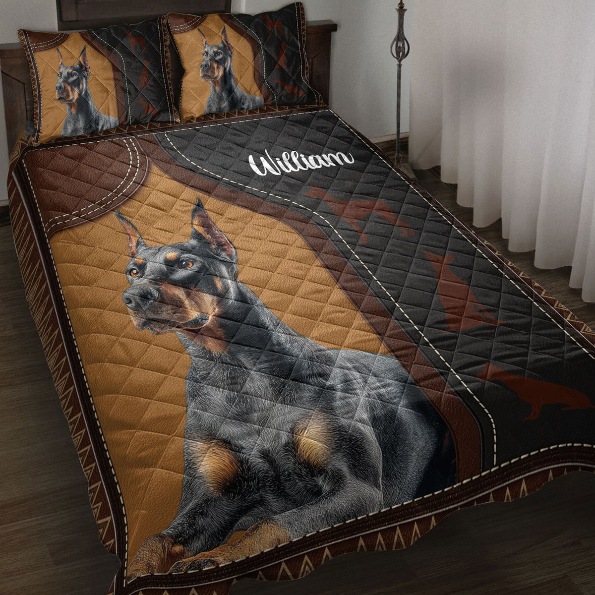 Doberman quilt bedding set displayed on a bed with black, tan, and brown stitched artwork