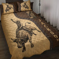 Rodeo quilt blanket with bull rider artwork, cowboy boots, Western lettering, and tan brown bedding design