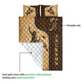 Rodeo quilt bedding set showing printed Western artwork and quilted white backing detail