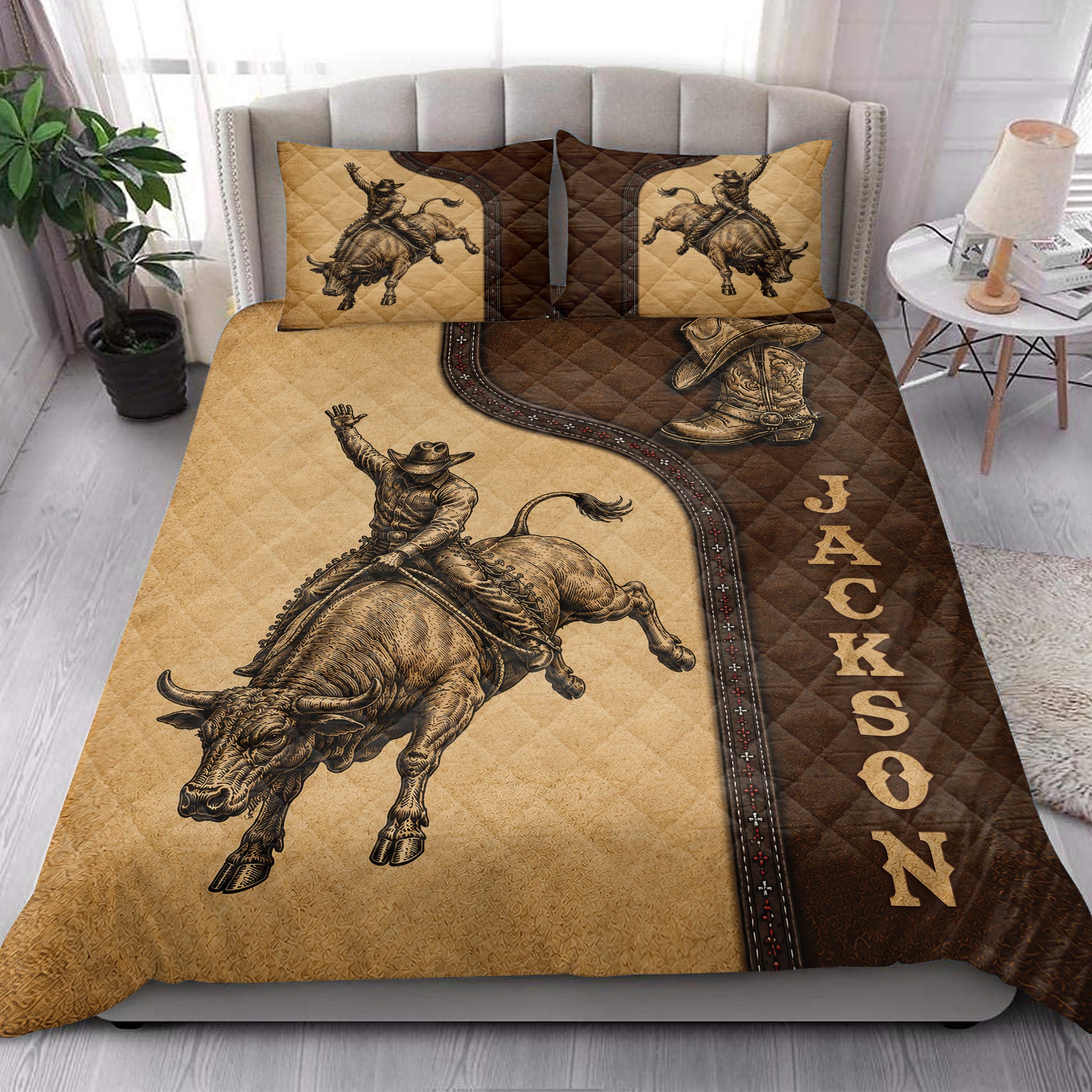 Rodeo quilt blanket styled on a bed with bull rider, cowboy boot, and Western bull artwork
