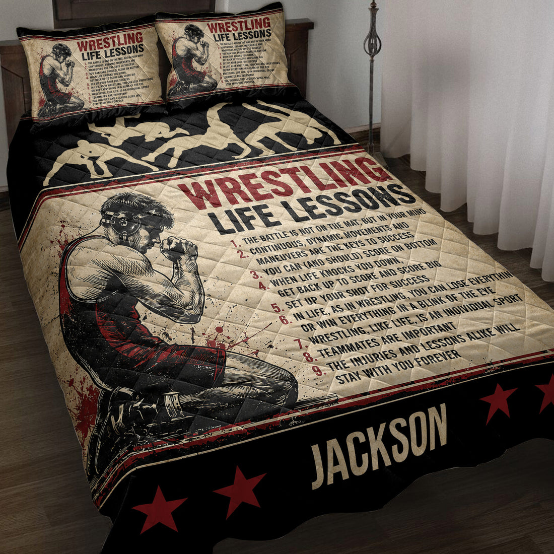 Wrestling quilt blanket displayed on a bed with grappling silhouettes, red stars, and motivational sports artwork