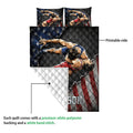 Wrestling quilt showing a vivid grappling design, printed side, and quilted white backing detail
