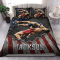 Wrestling quilt bedding set styled in a bright bedroom with dramatic red, blue, black, and gray artwork
