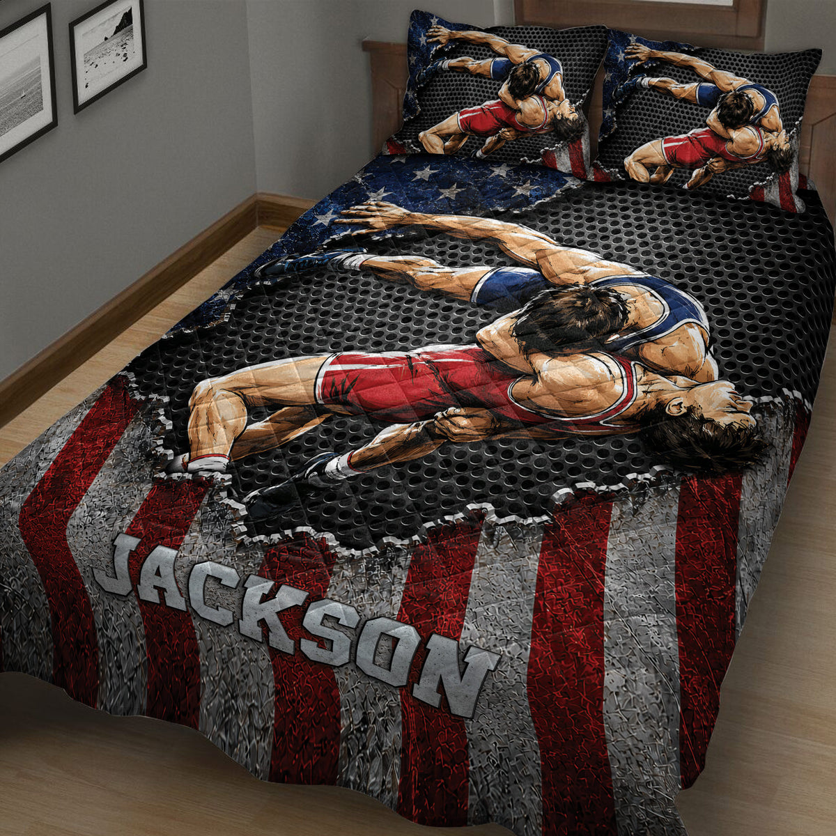 Close bedroom view of a wrestling quilt featuring two athletes grappling across a bold red and black design