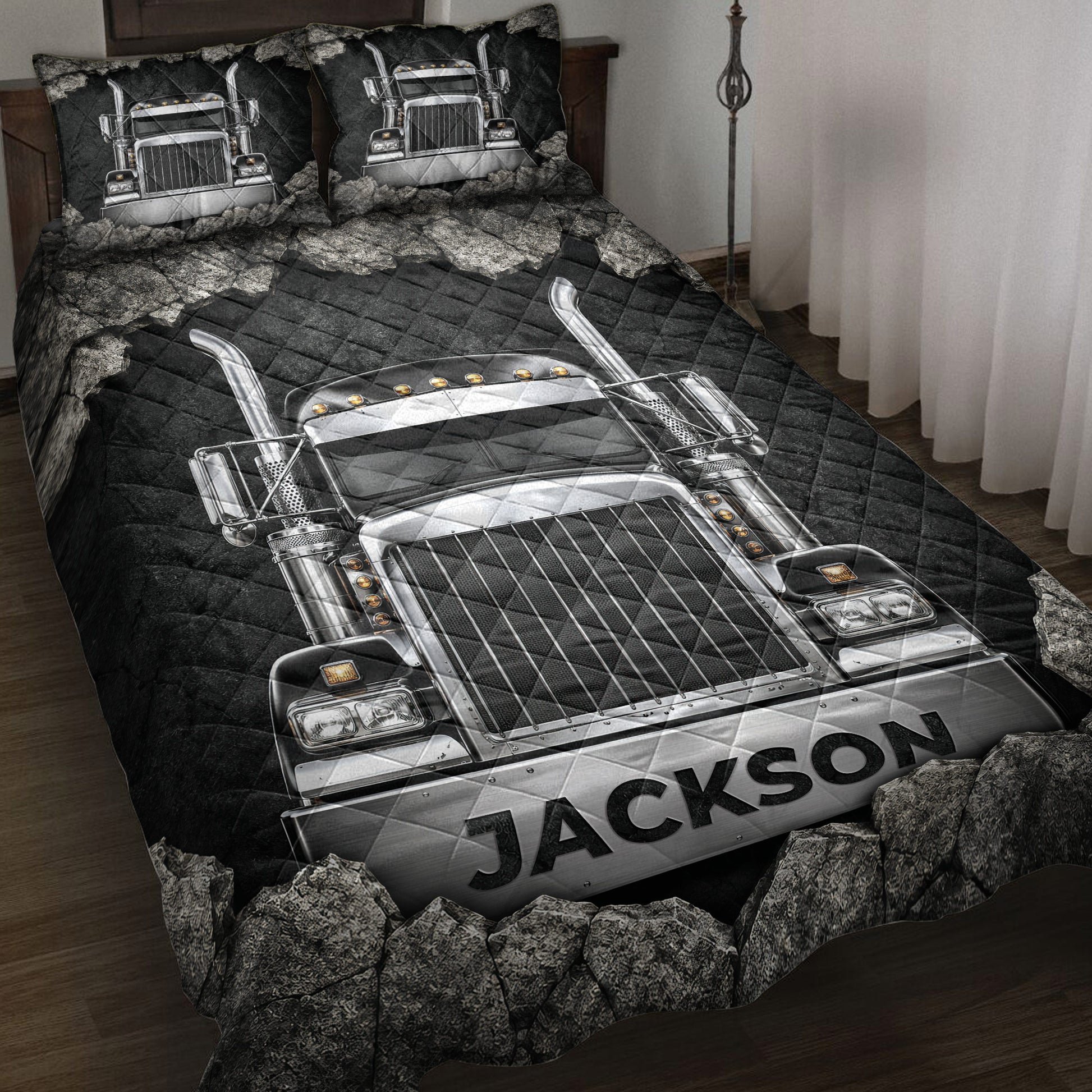 Trucker quilt blanket displayed on a bed with large chrome semi truck artwork in black and silver