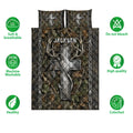 Hunting quilt bedding set shown front-facing with camouflage woodland artwork, deer antlers, and feature icons