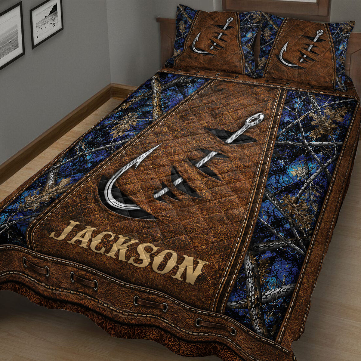 Close view of fishing quilt bedding with oversized hooks, brown leather-inspired panels, and blue woodland camouflage