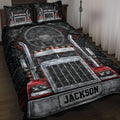 Trucker quilt bedding set displayed on a bed with red semi truck artwork and dashboard details