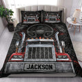 Trucker quilt bedding set styled on a bed with bold red and black semi truck artwork