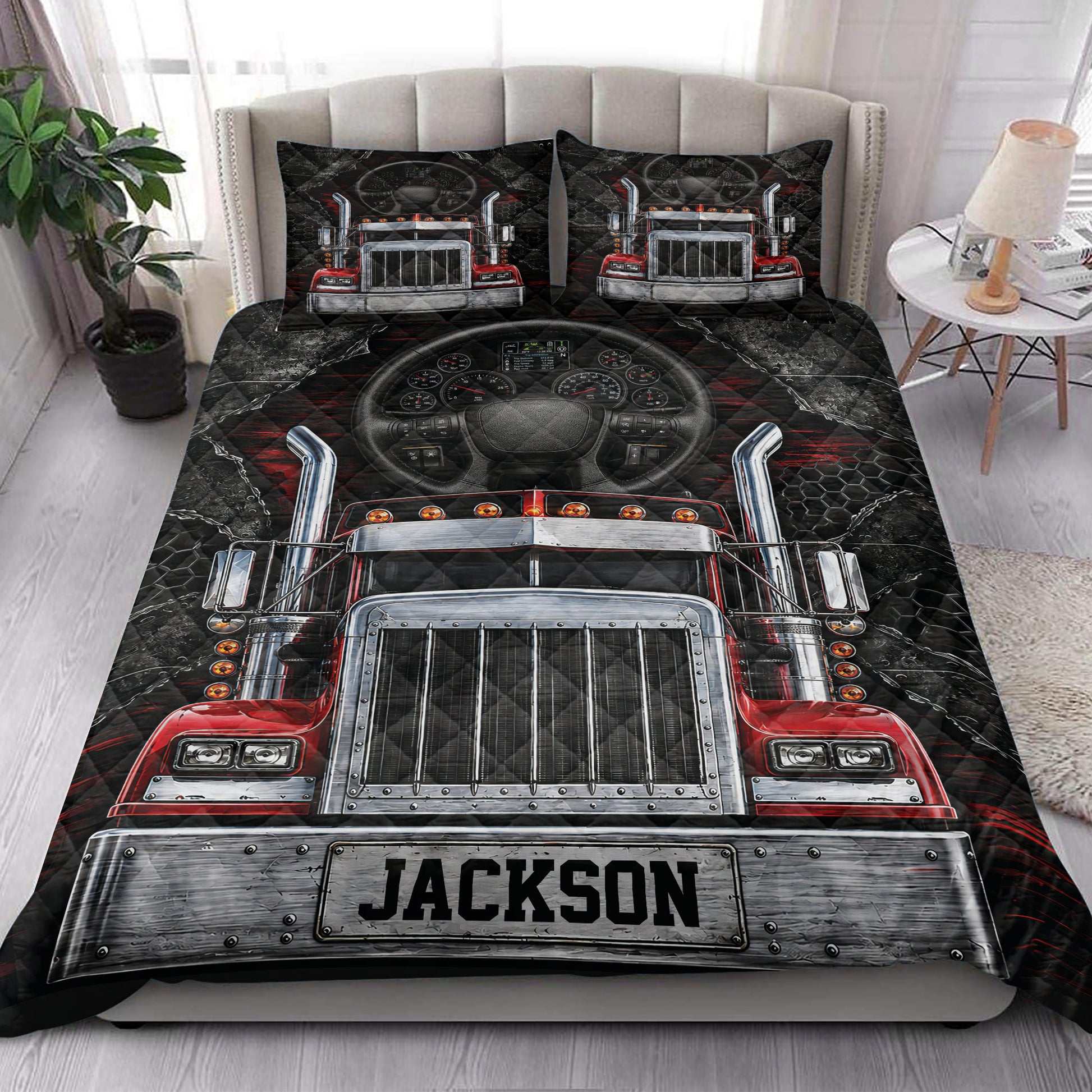 Trucker quilt bedding set styled on a bed with bold red and black semi truck artwork