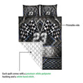 Racing quilt blanket detail showing the printed checkered flag side and white quilted backing
