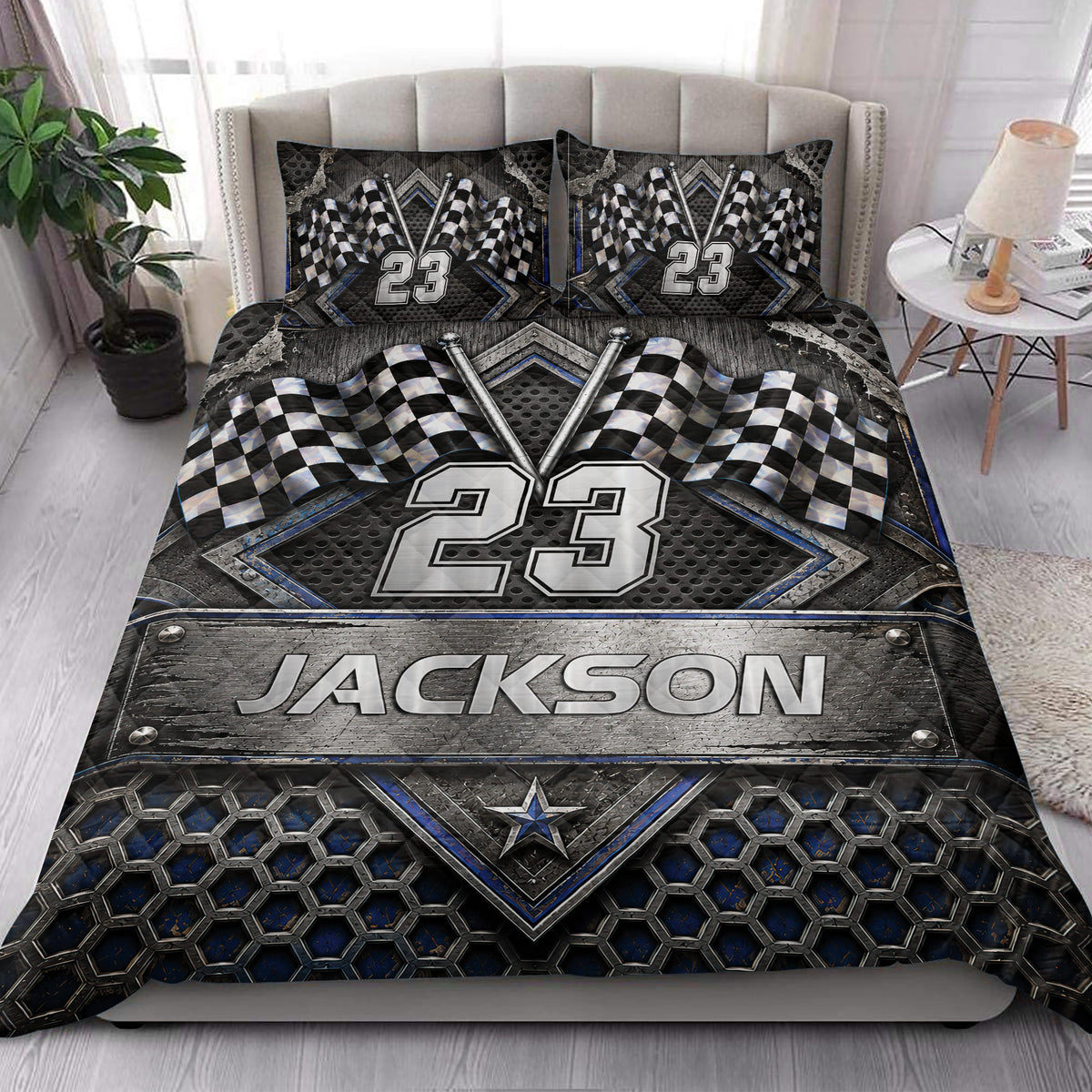 Racing quilt bedding styled in a bright bedroom with checkered flags and metallic motorsport artwork