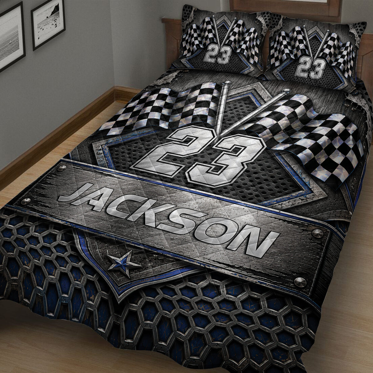 Close view of a racing quilt blanket with checkered flags, bold blue accents, and industrial automotive-inspired texture