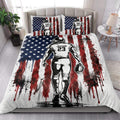 Patriotic American football quilt blanket styled in a bright bedroom with player artwork