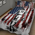 American football quilt blanket spread across a bed with bold red, white and blue graphics