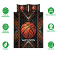 Basketball quilt bedding set displayed flat with orange basketball artwork and black geometric borders