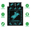 Rodeo quilt bed set displayed with turquoise bull riding artwork, black background, and product feature icons