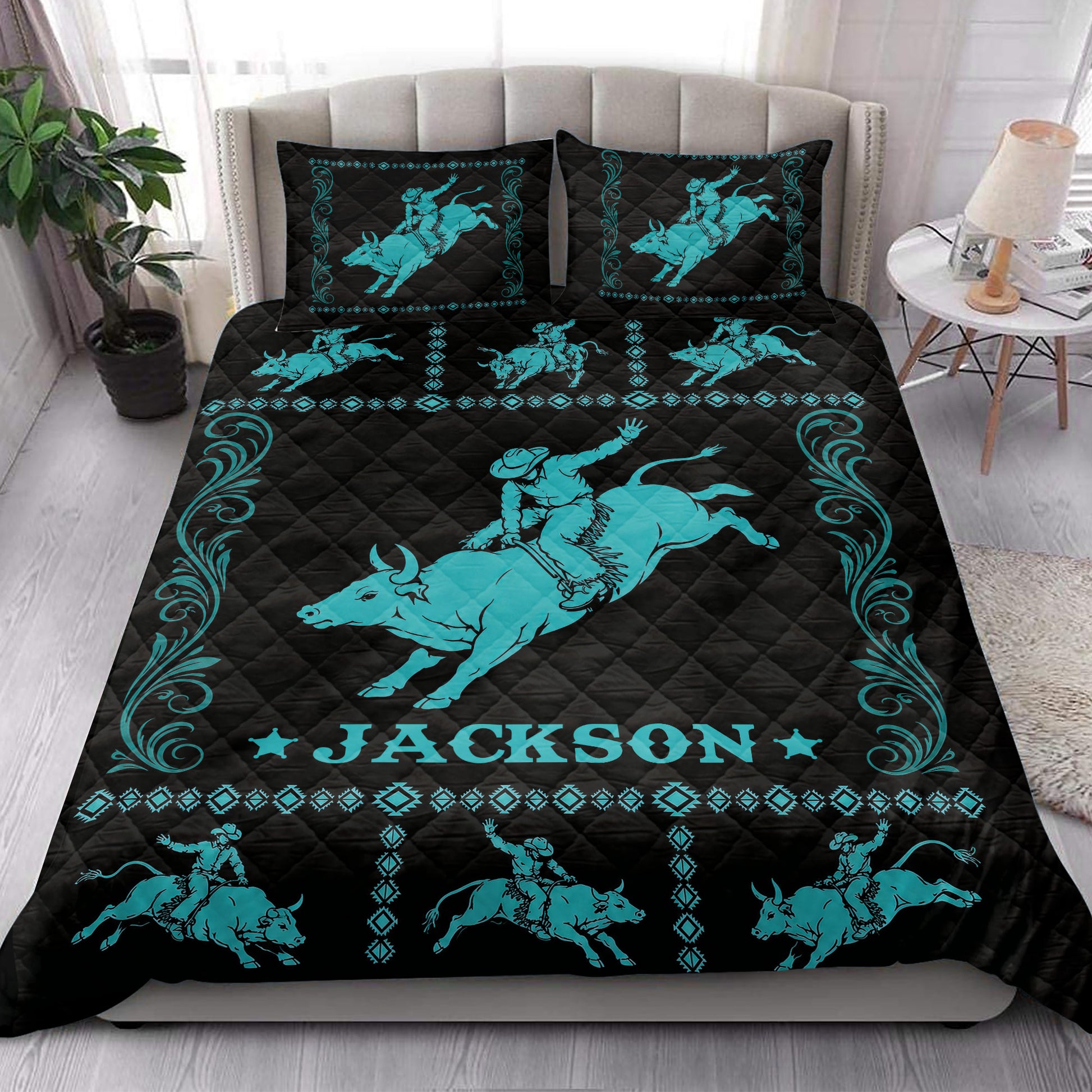 Rodeo quilt bedding styled on a bed with turquoise bull riders, western borders, and black diamond quilting