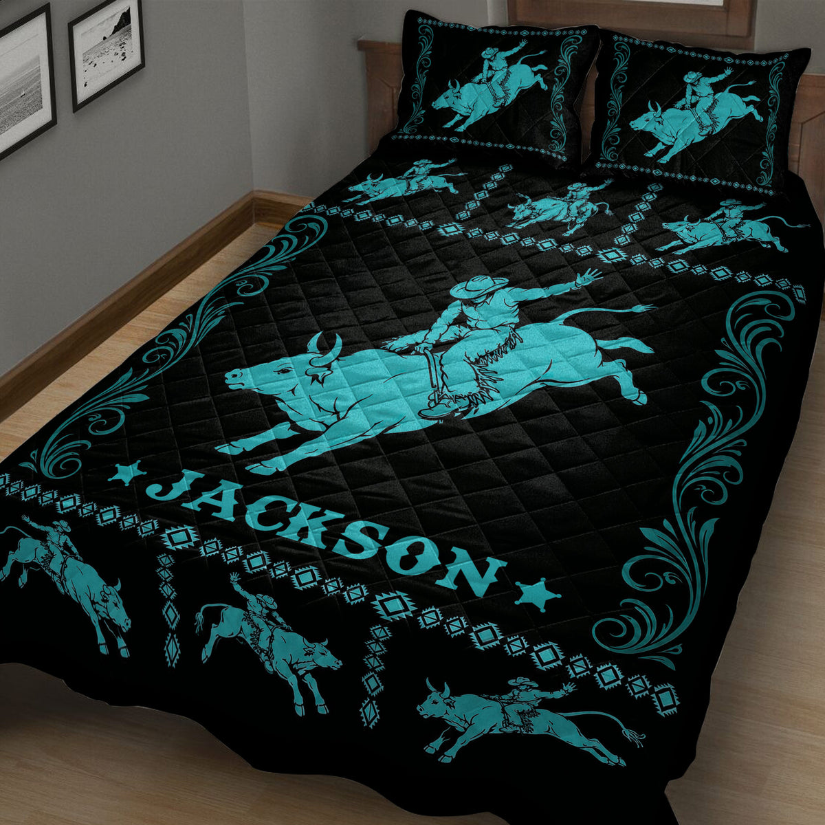 Black and turquoise rodeo quilt blanket featuring a large bull rider, bucking bulls, and western pattern details