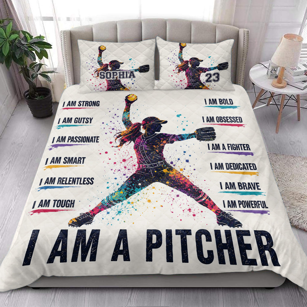 Softball quilt blanket styled in a bright bedroom with female pitcher artwork and bold sports-inspired accents