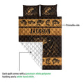 Fishing quilt blanket showing the printed bass artwork on the front and the white quilted backing