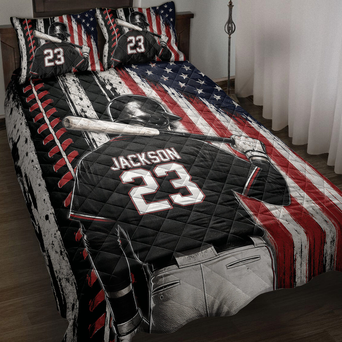 Baseball quilt blanket displayed on a bed with batter artwork, stars, and distressed red, white, and blue stripes