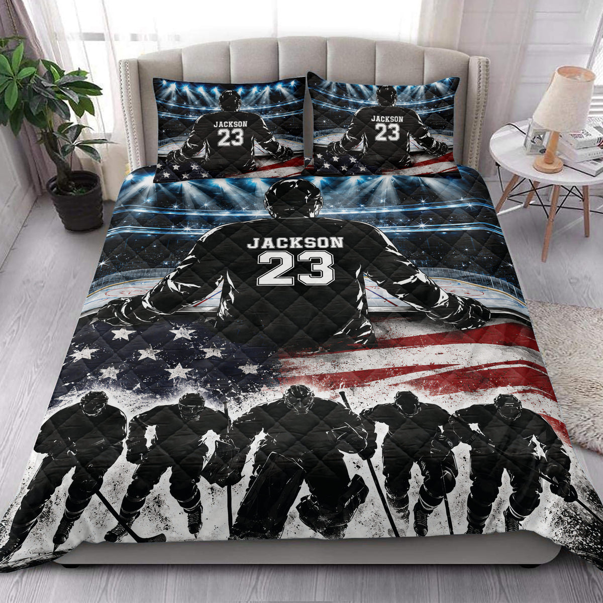 Hockey quilt bedding styled in a bedroom with illuminated rink artwork, ice players, sticks, and bold red, white, and blue details