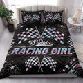 Racing quilt bedding styled in a bright bedroom with crossed checkered flags and colorful racing graphics