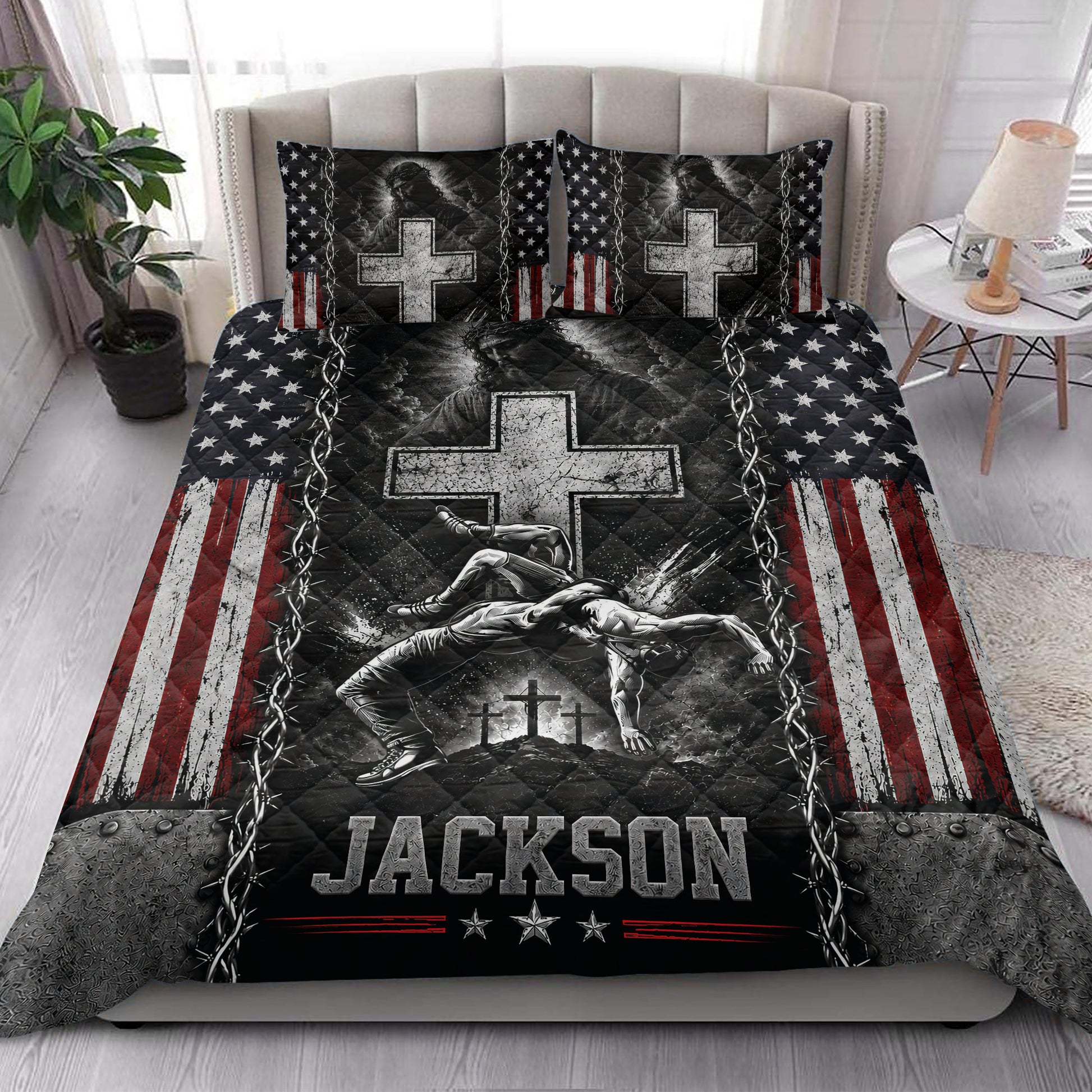 Wrestling quilt bedding set styled in a bedroom with dramatic black, red, and white artwork