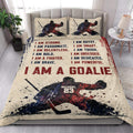Hockey quilt blanket styled in a bright bedroom with matching hockey player artwork and bold red and navy graphics